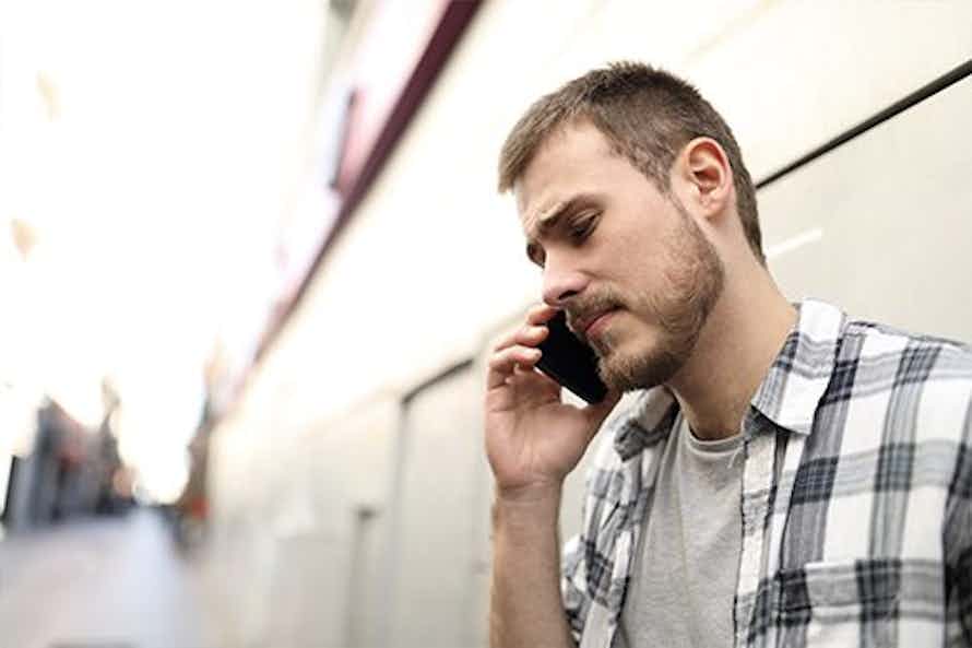 Man getting counseling to quit tobacco on the phone